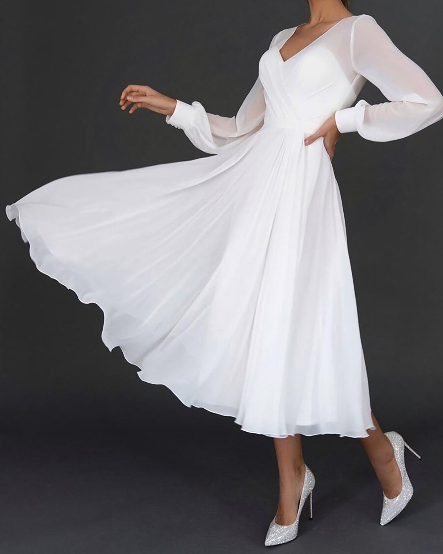 Graceful midi dress with long sheer sleeves