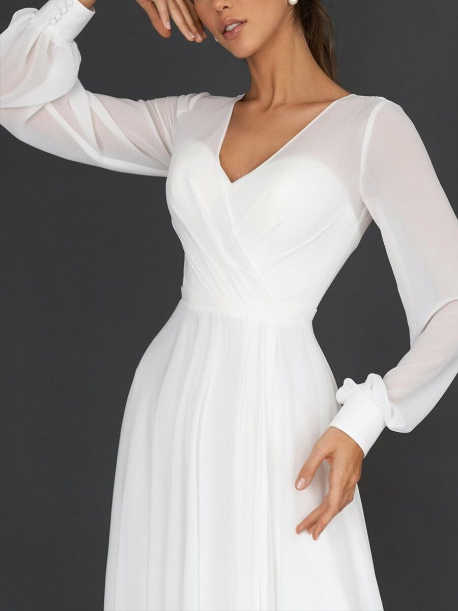 Graceful midi dress with long sheer sleeves