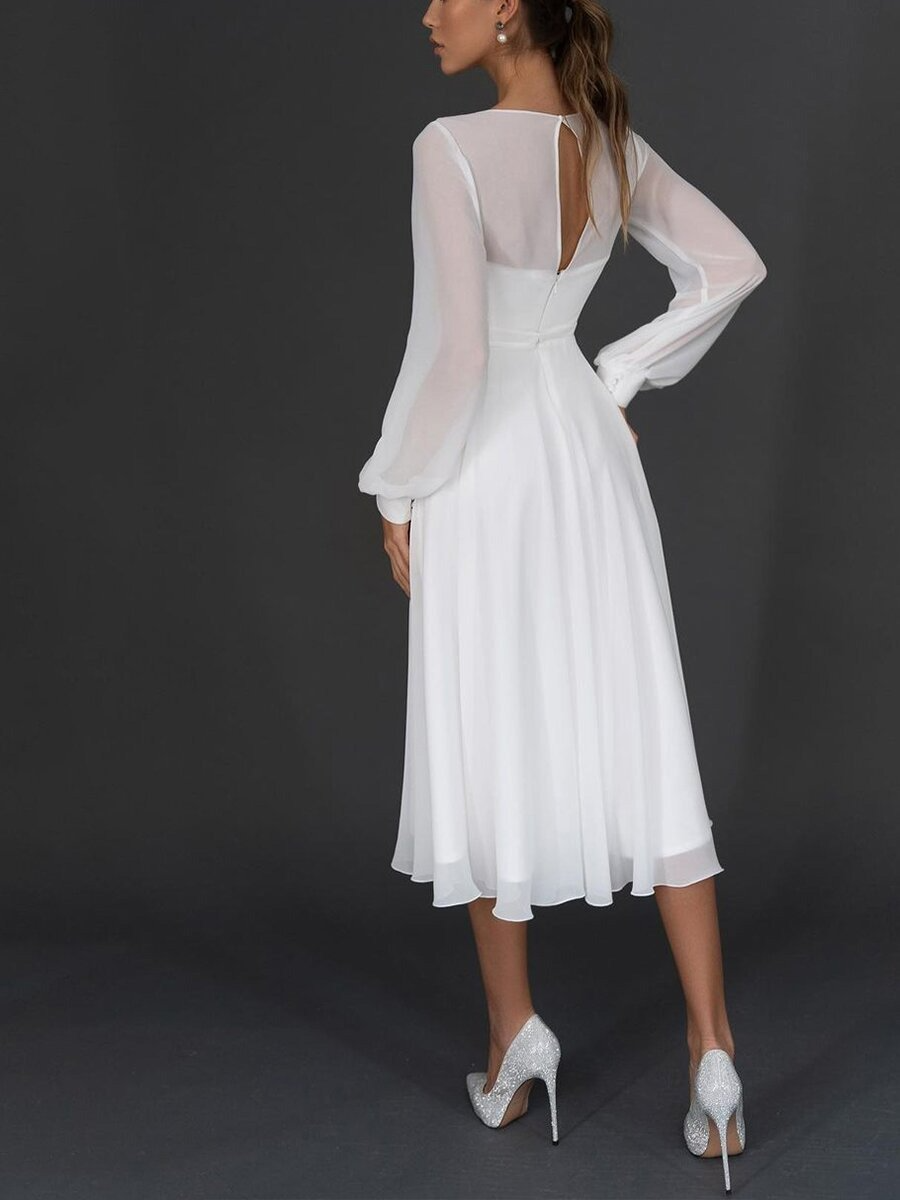 Graceful midi dress with long sheer sleeves