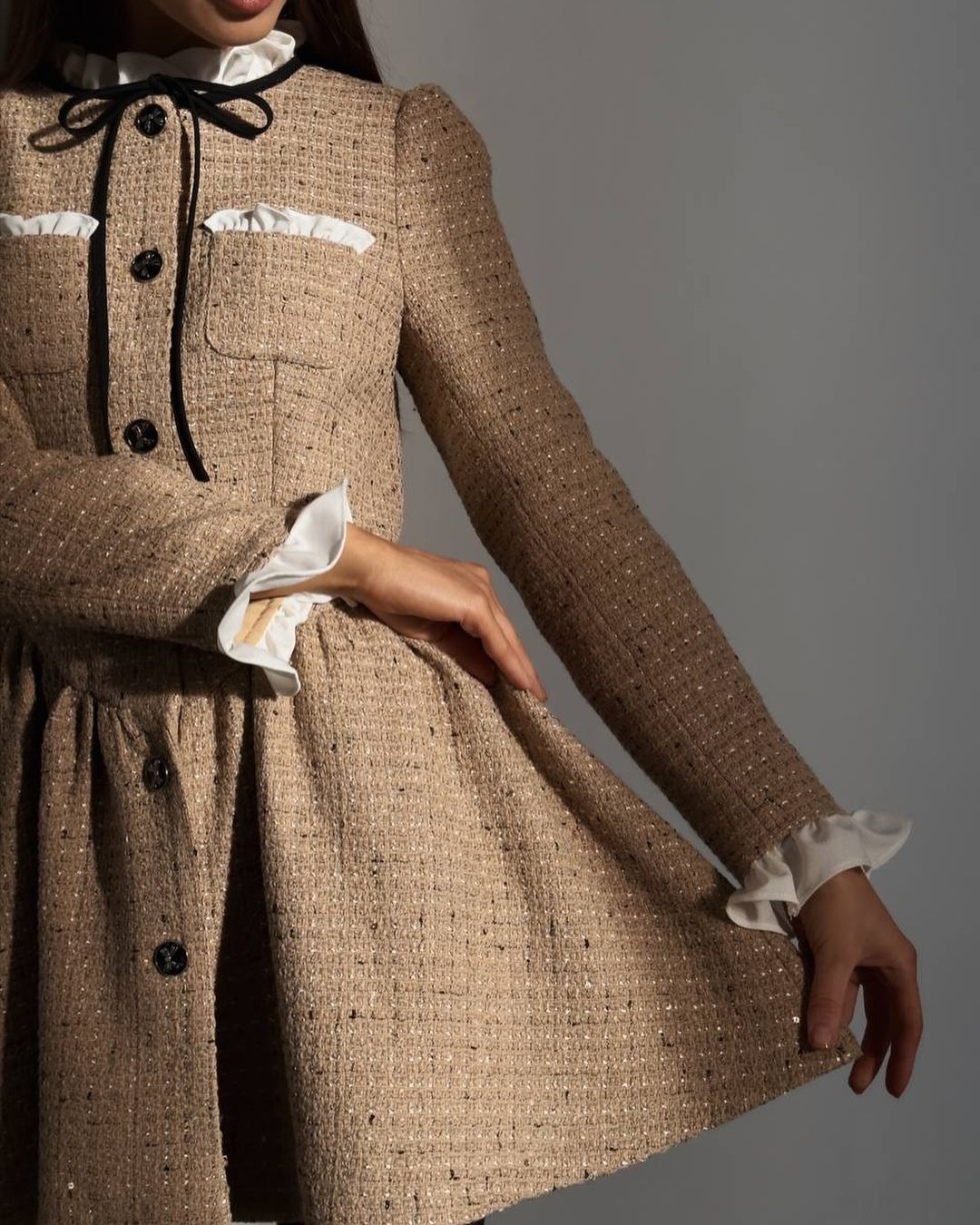 Tweed dress with a voluminous skirt