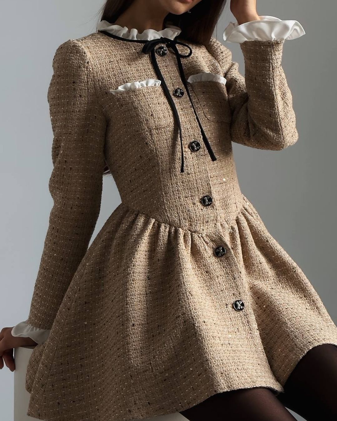 Tweed dress with a voluminous skirt