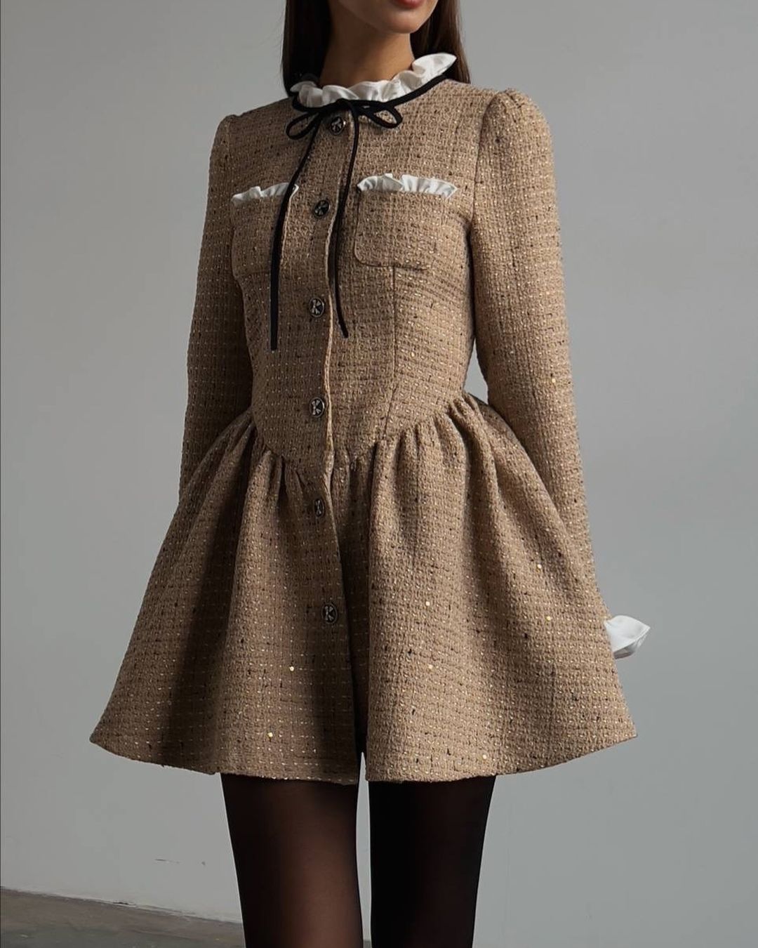 Tweed dress with a voluminous skirt